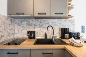 Bezauberndes Apartment nur 150 Meter zum Strand mit Meerblick, Grill, WiFi