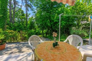 Beeindruckendes Apartment direkt am Strand mit privater Terrasse, Privatparkplatz, WiFi, Grill 