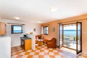 Helles Apartment mit traumhaften Meerblick, Grill und nur 500 Meter zum Strand