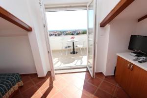 Beeindruckendes Apartment mit Dachterrasse, Meerblick, Babybett, Klima, Privatparkplatz