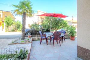 Hundefreundliches Apartment nur 600 Meter zum Strand mit Grillbereich, privater Terrasse, Waschmasch 