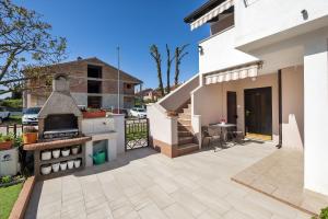 Cozy Apartment nur 600 Meter zum Strand mit Grill, privater Terrasse, Waschmaschine 