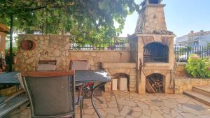 Charmantes Apartment nur 700 Meter zum Strand mit BBQ-Bereich, Terrasse, Privatparkplatz 