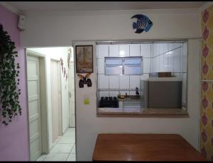 Pé na areia praia caiçara