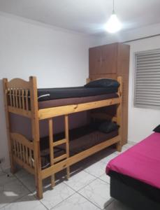 Pé na areia praia caiçara