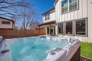 Downtown Bliss Modern 4-Bedroom Retreat w Hot Tub