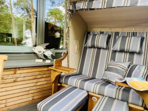 Ferienwohnung Strandkorb & Mee h r Parkvillen Carlota und Candela Baabe