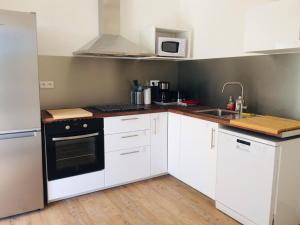 Maisons de vacances Jacuzzi & Sauna privatifs - Vue mer : photos des chambres