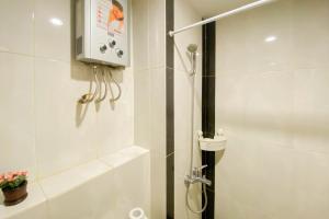 Cozy 1BR without Living Room Grand Kamala Lagoon Apartment By Travelio