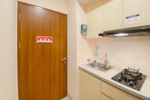 Cozy 1BR without Living Room Grand Kamala Lagoon Apartment By Travelio