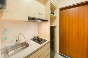 Cozy 1BR without Living Room Grand Kamala Lagoon Apartment By Travelio