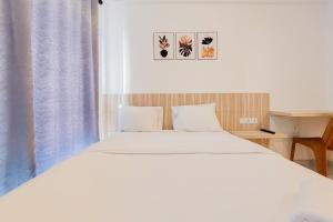 Functional Studio at Sky House BSD Apartment near AEON MAll By Travelio