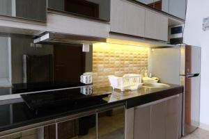 Luxury 1BR Apartment at Dago Suites By Travelio