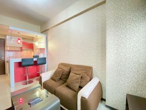 Modern Designed 2BR at Suites @Metro Apartment By Travelio