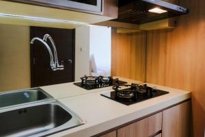 Good Deal Studio Room at Easton Park Residence Jatinangor Apartment By Travelio