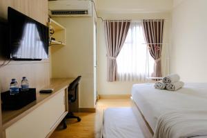 Good Deal Studio Room at Easton Park Residence Jatinangor Apartment By Travelio