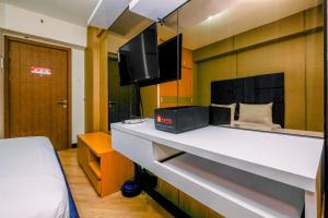 Pleasurable and Tidy Studio Cinere Resort Apartment By Travelio
