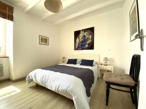 Maisons de vacances Maison ancienne charmante avec jardin, proche du port de Groix - FR-1-813-8 : photos des chambres