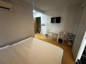 Phòng Bốn Người Có Phòng Tắm Riêng (Quadruple Room with Private Bathroom)