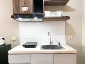 Good Choice Studio Gateway Park LRT City Jatibening Apartment By Travelio