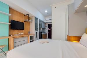 Warm and Cozy Stay Studio at Casa de Parco Apartment By Travelio