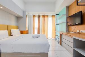 Warm and Cozy Stay Studio at Casa de Parco Apartment By Travelio