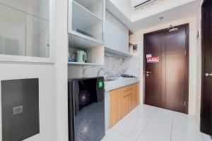 Warm and Cozy Stay Studio at Casa de Parco Apartment By Travelio