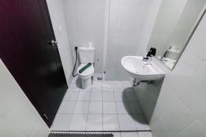 Warm and Cozy Stay Studio at Casa de Parco Apartment By Travelio