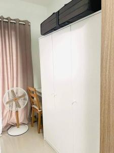 Affordable Staycation Condo with WIFI near MOA and Airport