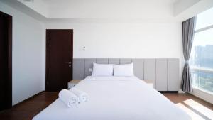 Exclusive and Spacey 3BR at Grand Sungkono Lagoon Apartment By Travelio