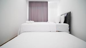 Exclusive and Spacey 3BR at Grand Sungkono Lagoon Apartment By Travelio