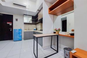 Homey and Best Deal 1BR Casa de Parco Apartment By Travelio