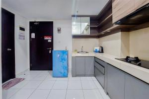 Homey and Best Deal 1BR Casa de Parco Apartment By Travelio