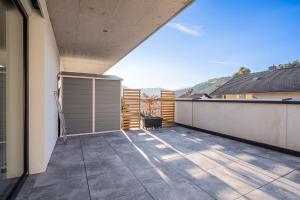 Modernes Studio mit sonniger Dachterrasse