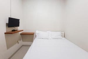 Wisma Al Iman Syariah 25 Mitra RedDoorz