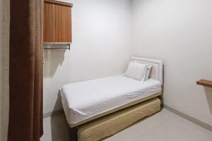 Wisma Al Iman Syariah 25 Mitra RedDoorz