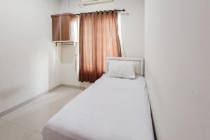 Wisma Al Iman Syariah 25 Mitra RedDoorz