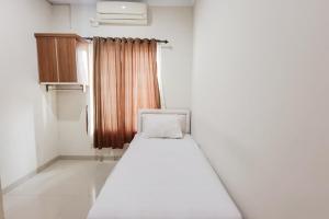 Wisma Al Iman Syariah 25 Mitra RedDoorz