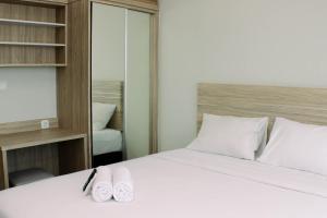 Stunning and Comfy Studio Apartment Springlake Summarecon Bekasi By Travelio