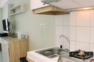 Stunning and Comfy Studio Apartment Springlake Summarecon Bekasi By Travelio