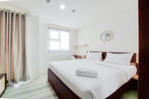 Homey Studio at Bintaro Icon Apartment By Travelio