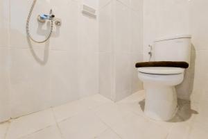 Homey and Simply Studio Room at Serpong Garden Apartment By Travelio