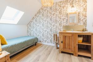 Maisons de vacances Gite La Grange aux Hirondelles - En campagne : photos des chambres