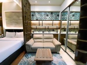 Cozy Studio Room at Uttara The Icon Apartment By Travelio