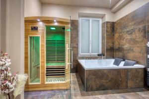 Appartements L-Ame Etoilee - Love Room avec Balneo & Sauna : photos des chambres