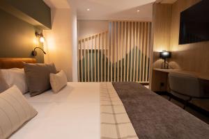 Quadruple Room room in Hotel Piolets Soldeu Centre
