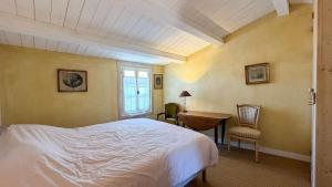 Villas Maison de village familiale avec sa cour lumineuse : photos des chambres