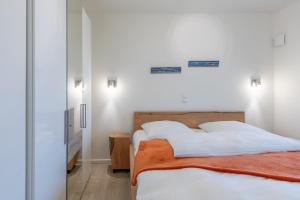 Ferienwohnung "Halligstork" direkt am Nordseedeich mit Blick auf den See