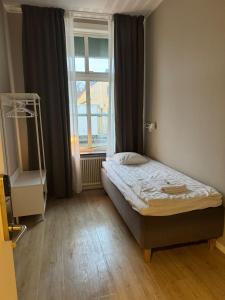 Single Room with Shared Bathroom room in Hostel Lidköping