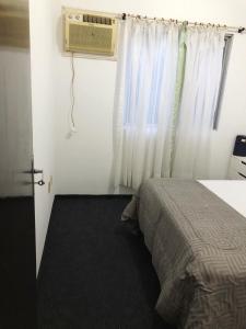 Quarto a 50 metros da praia